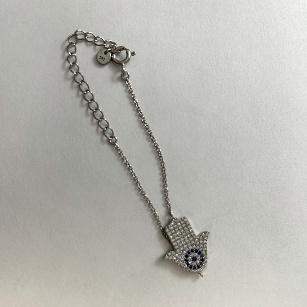 Sterling Hamsa Hand Bracelet with Blue Accent